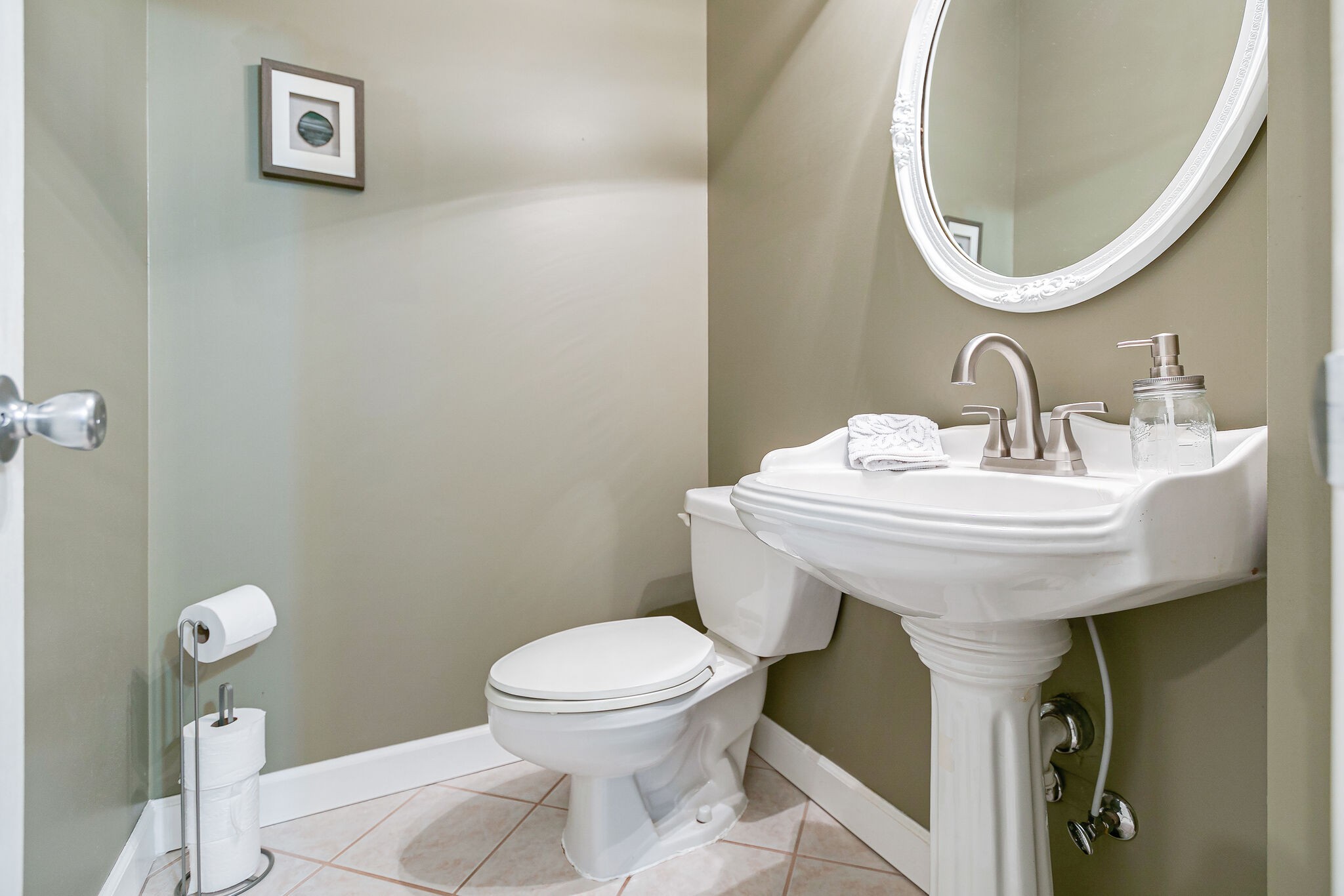 4311 Peytonsville-Trinity Road Franklin, TN 37064 - Photo 15 of 32 a bathroom with a toilet a sink and a mirror