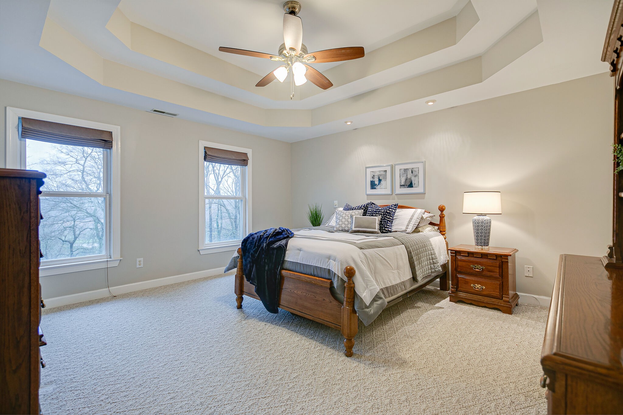4311 Peytonsville-Trinity Road Franklin, TN 37064 - Photo 16 of 32 a spacious bedroom with a bed and a chandelier