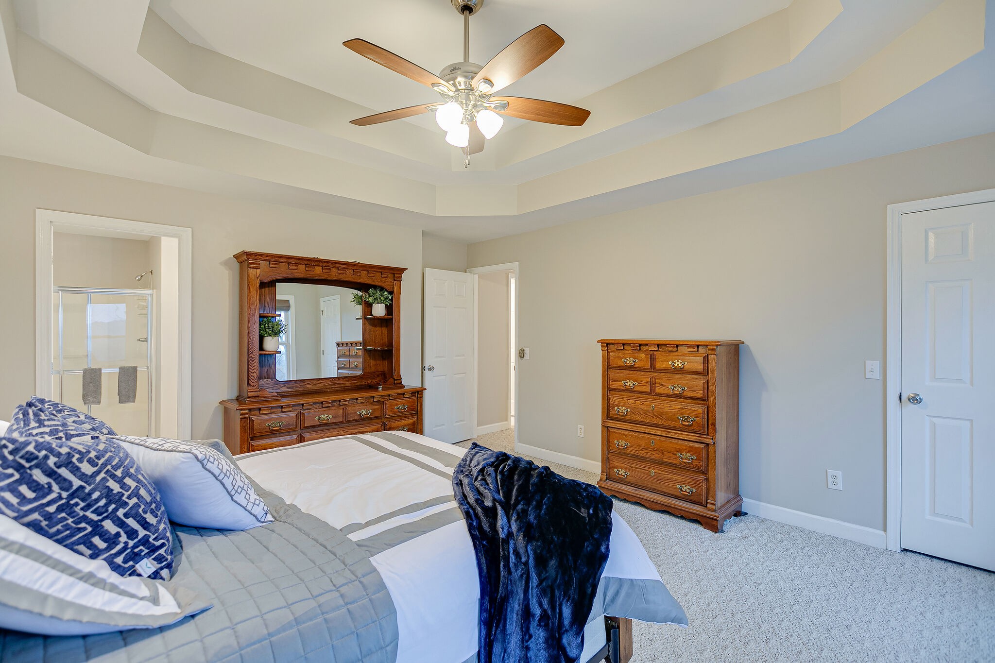 4311 Peytonsville-Trinity Road Franklin, TN 37064 - Photo 17 of 32 a bedroom with a bed and a chandelier