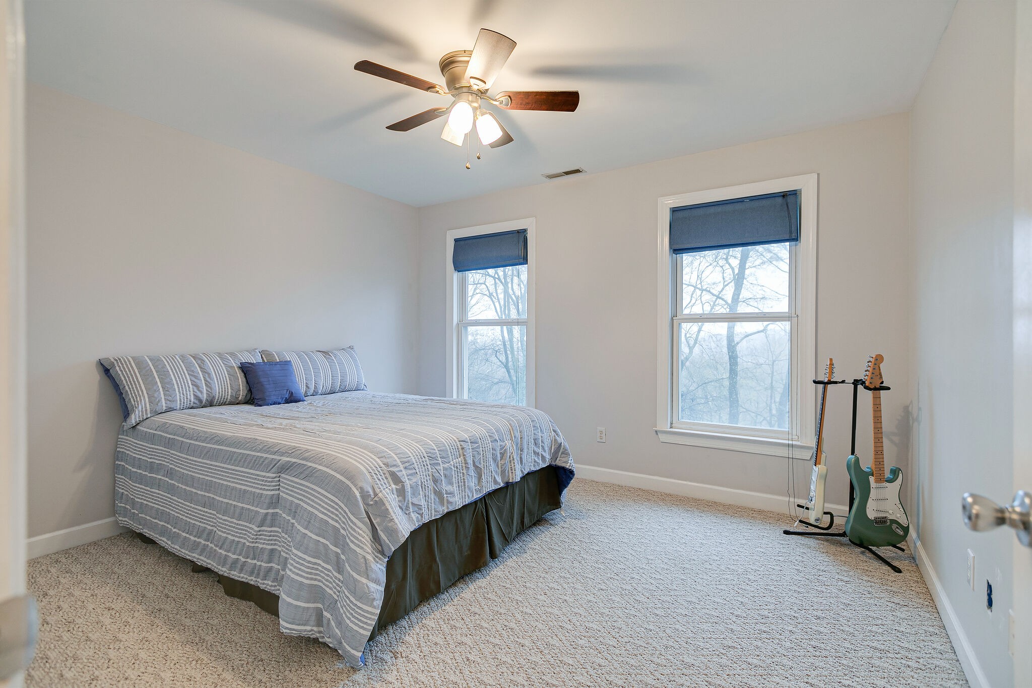 4311 Peytonsville-Trinity Road Franklin, TN 37064 - Photo 23 of 32 a spacious bedroom with a bed and a window