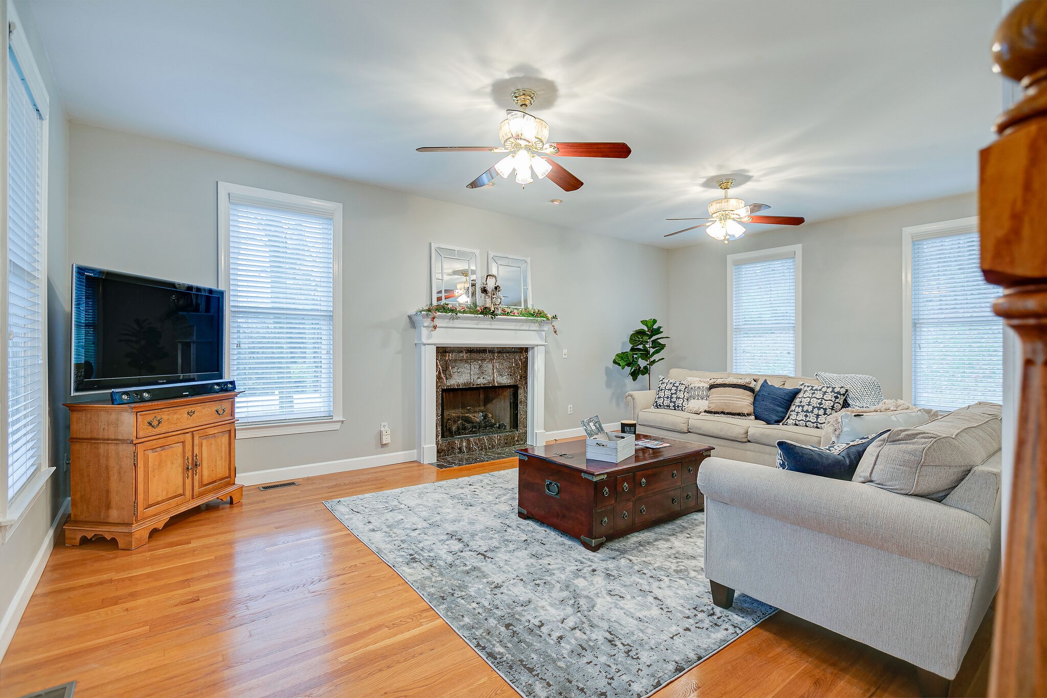 4311 Peytonsville-Trinity Road Franklin, TN 37064 - Photo 8 of 32 a living room with fireplace furniture and a flat screen tv