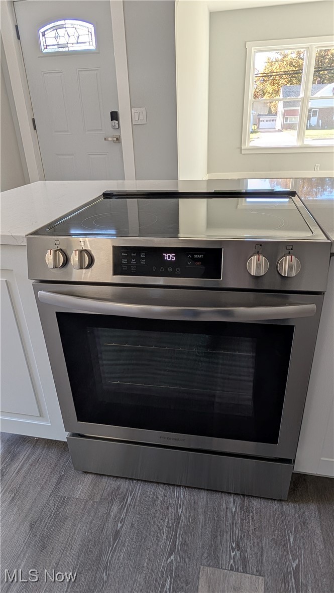 6089 Dunham Road Maple Heights, OH 44137 - Photo 11 of 40 New stainless steel stove at center kitchen island