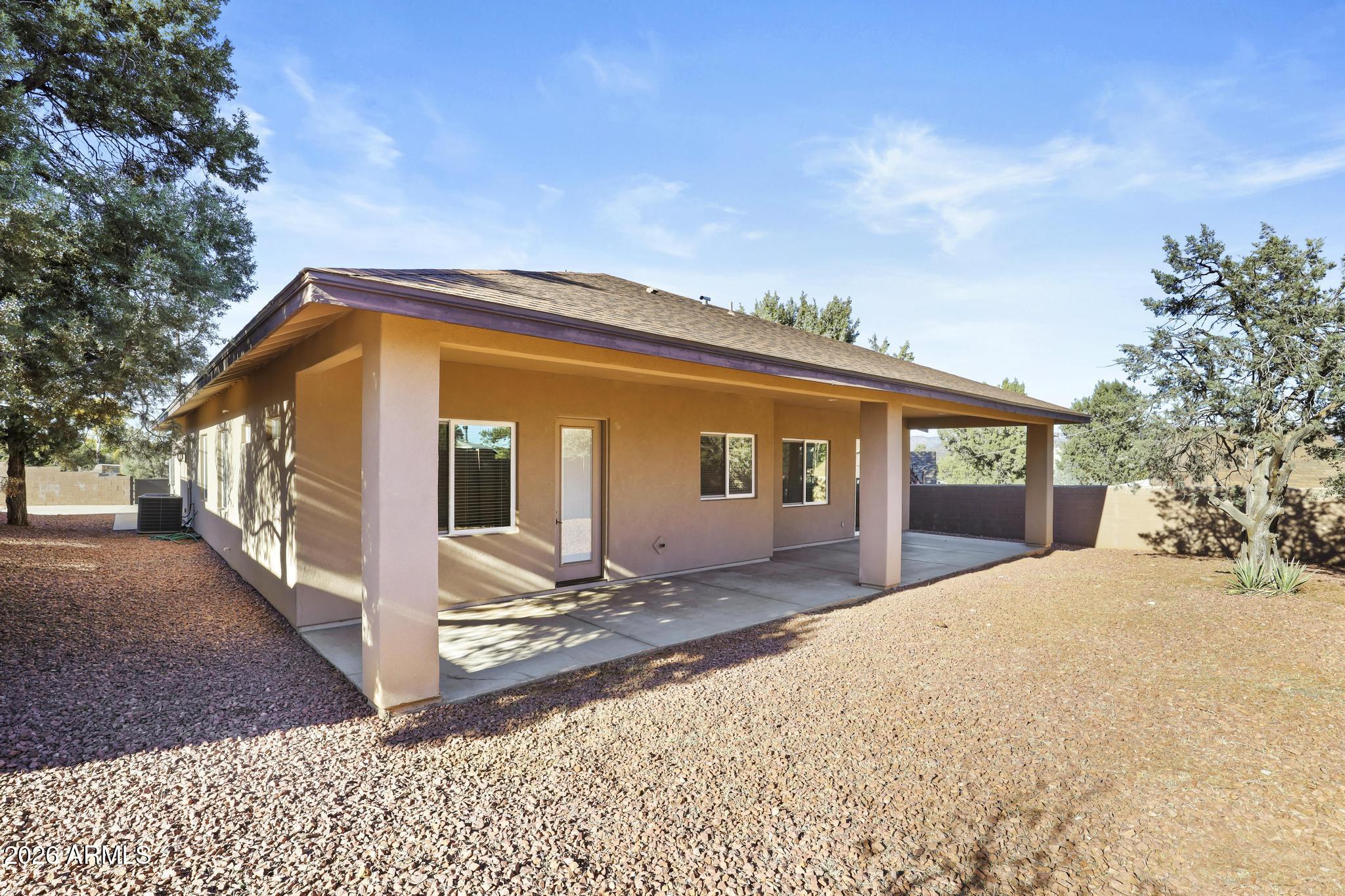 7705 Caballero Road Payson, AZ 85541 - Photo 24 of 43 a front view of a house with a yard