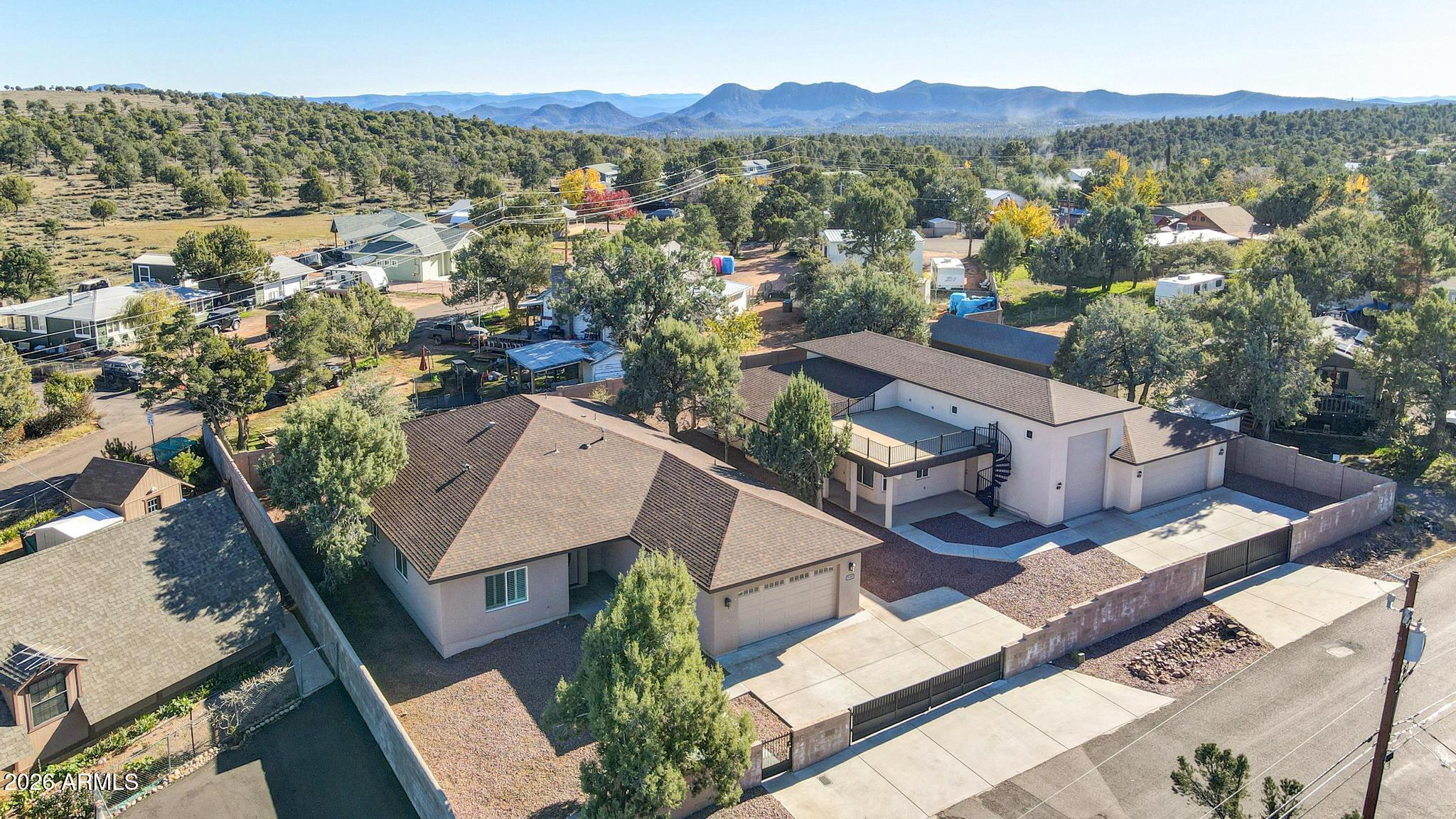 7705 Caballero Road Payson, AZ 85541 - Photo 4 of 43 an aerial view of a house