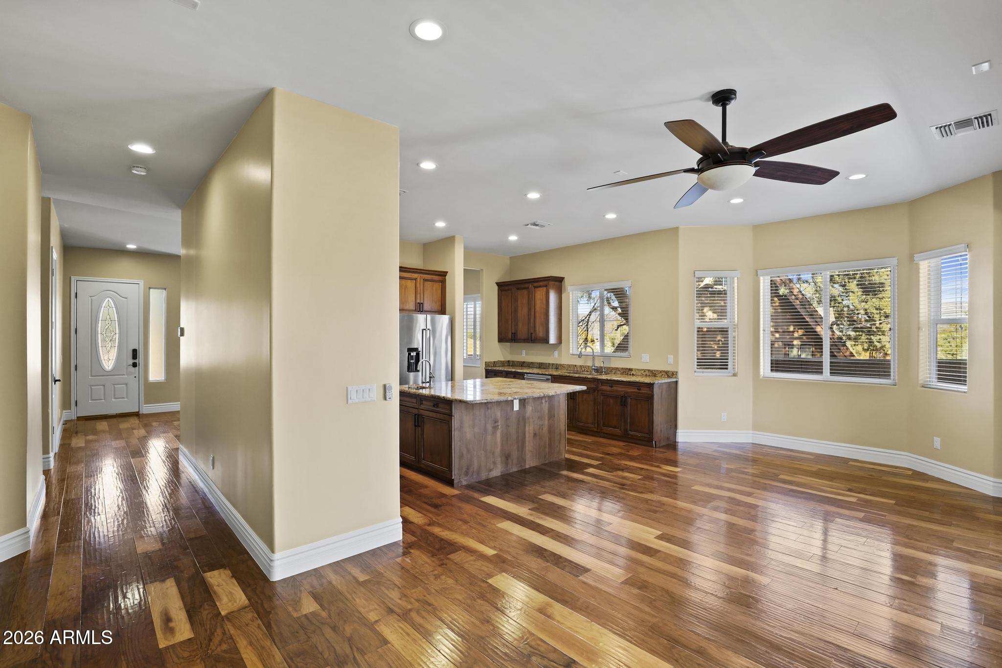 7705 Caballero Road Payson, AZ 85541 - Photo 10 of 43 a view of kitchen with cabinets and wooden floor