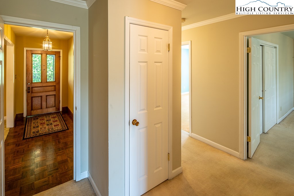 658 Rainbow Mountain Road Boone, NC 28607 - Photo 17 of 28 a view of a hallway with wooden floor and closet