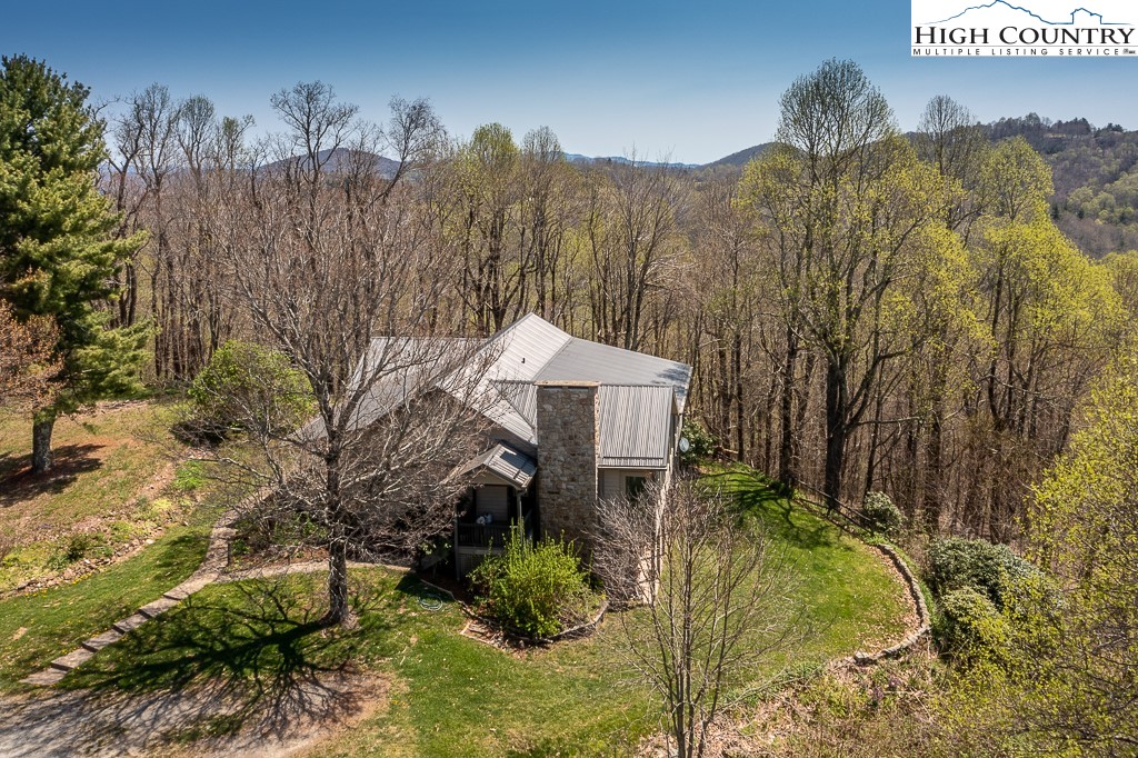 658 Rainbow Mountain Road Boone, NC 28607 - Photo 4 of 28 a view of a houses with a yard