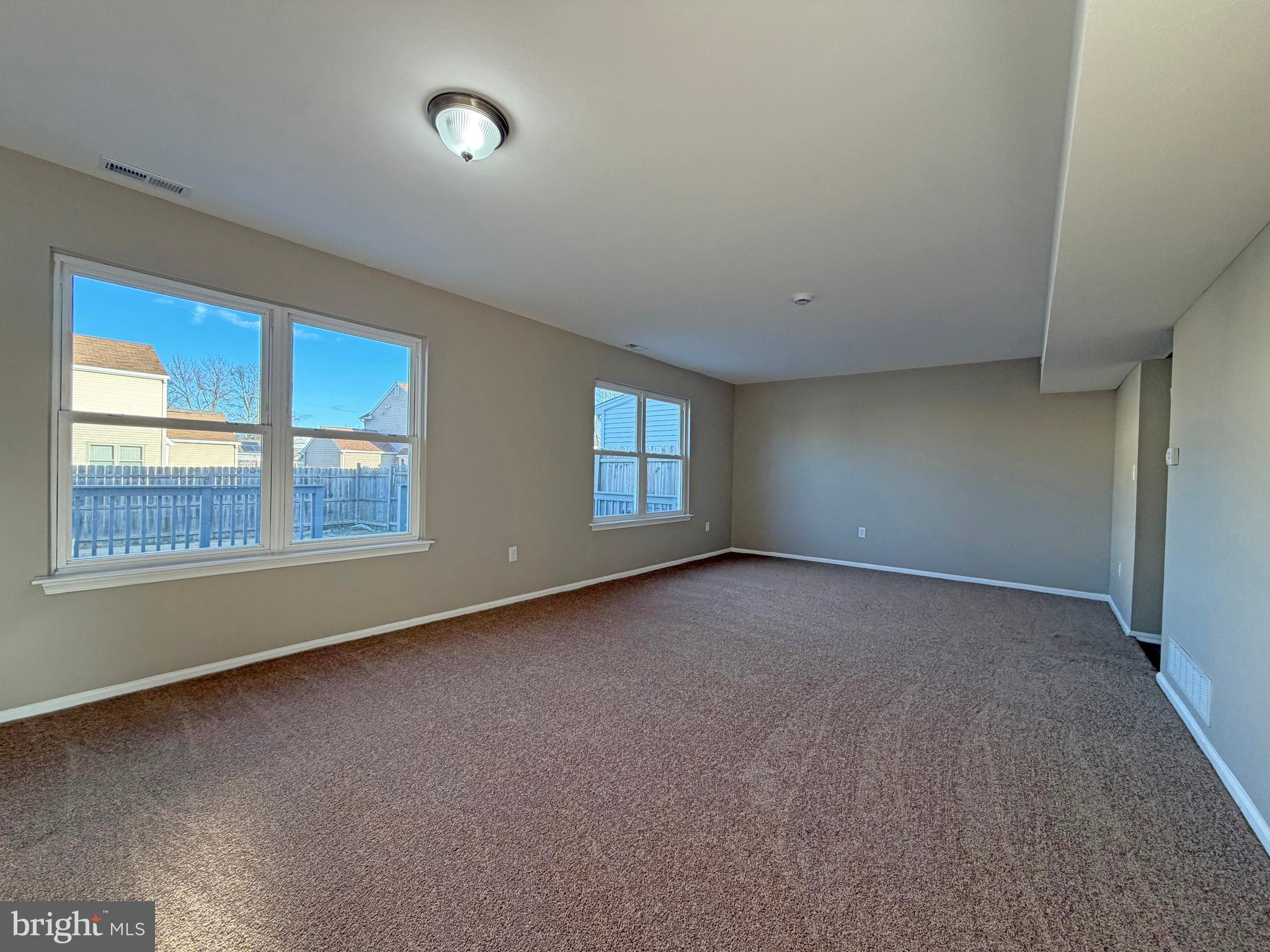 79 Scenic View Drive Sicklerville, NJ 08081 - Photo 3 of 11 a view of an empty room with a window
