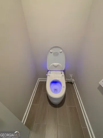 a bathroom with a sink and toilet