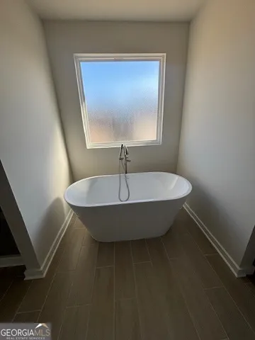 a view of a hallway with a chandelier