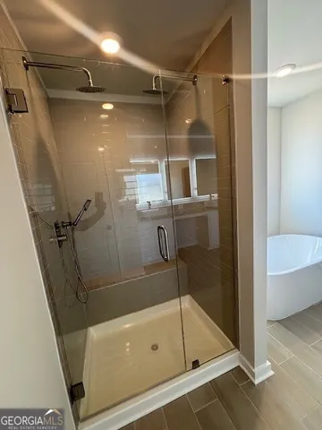 a bathroom with a bath tub