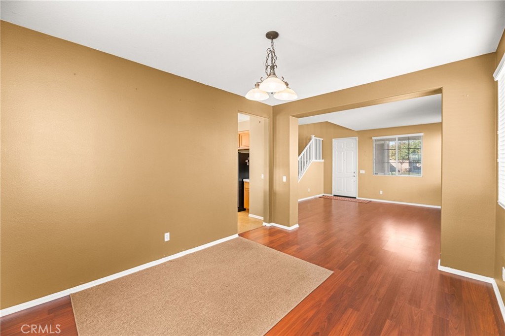 1339 Addison Way Perris, CA 92571 - Photo 15 of 67 a view of livingroom with hardwood floor and ceiling fan