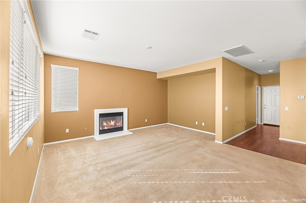 1339 Addison Way Perris, CA 92571 - Photo 19 of 67 a view of an empty room with a window