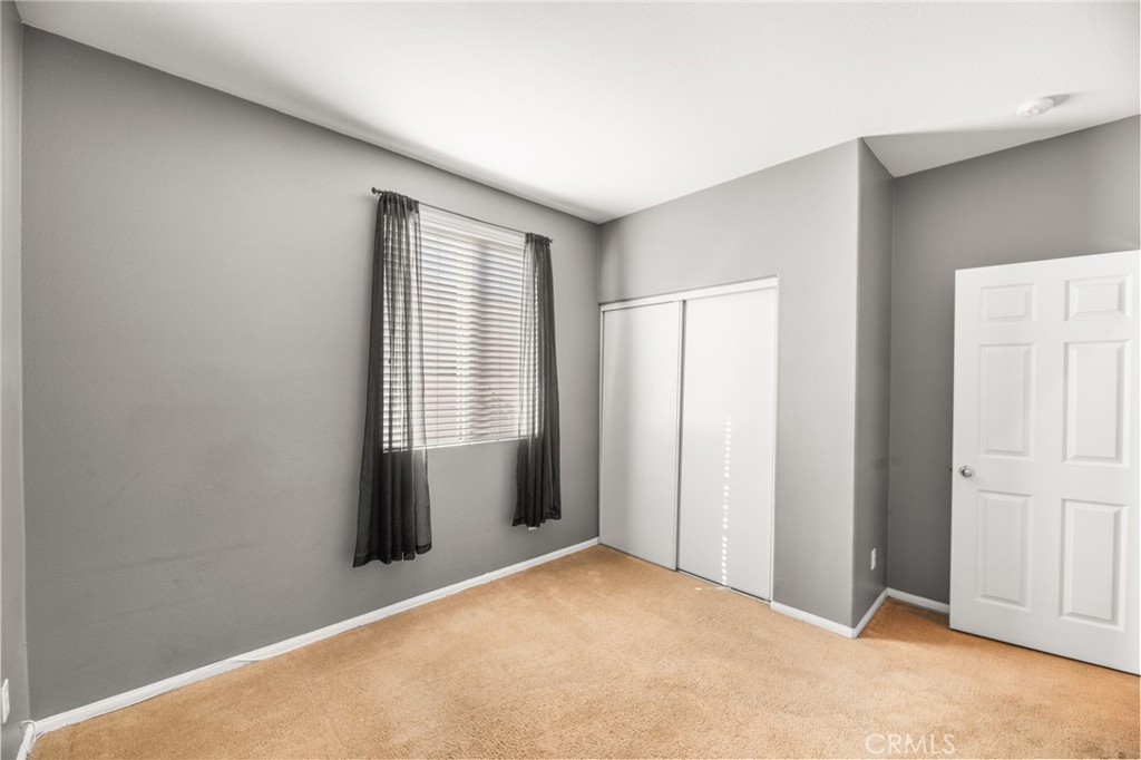 1339 Addison Way Perris, CA 92571 - Photo 21 of 67 a view of an empty room with a window