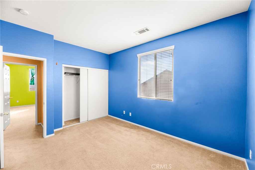 1339 Addison Way Perris, CA 92571 - Photo 27 of 67 a view of an empty room with a window