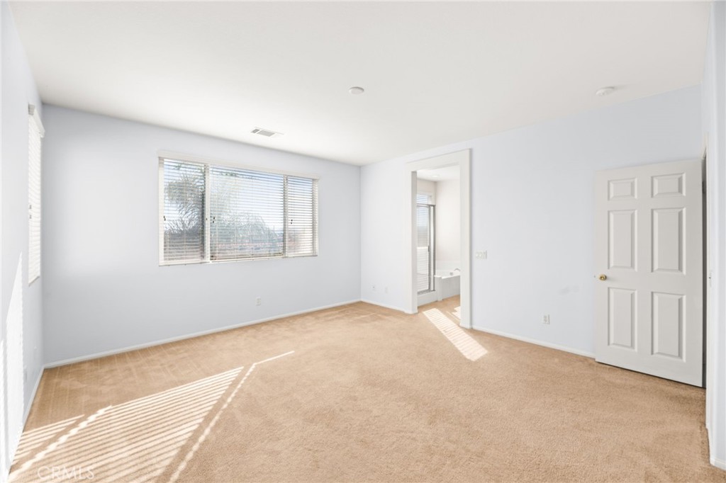 1339 Addison Way Perris, CA 92571 - Photo 30 of 67 a view of an empty room with windows