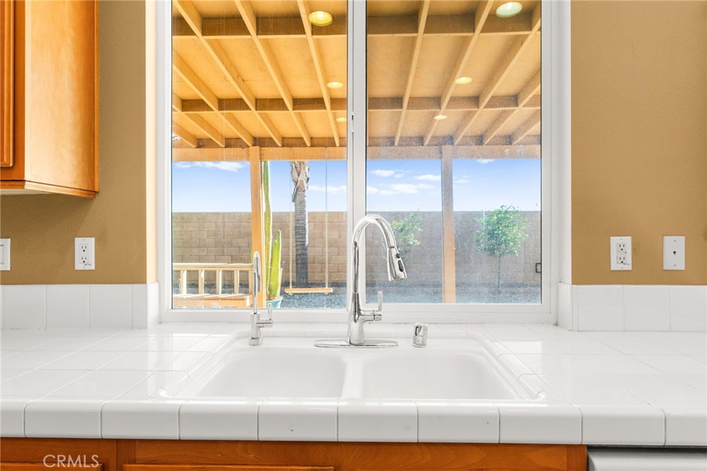 1339 Addison Way Perris, CA 92571 - Photo 9 of 67 a kitchen with a sink and a window