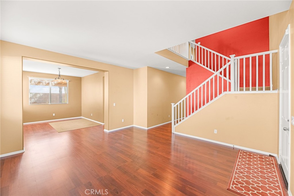 1339 Addison Way Perris, CA 92571 - Photo 10 of 67 a view of an entryway with wooden floor