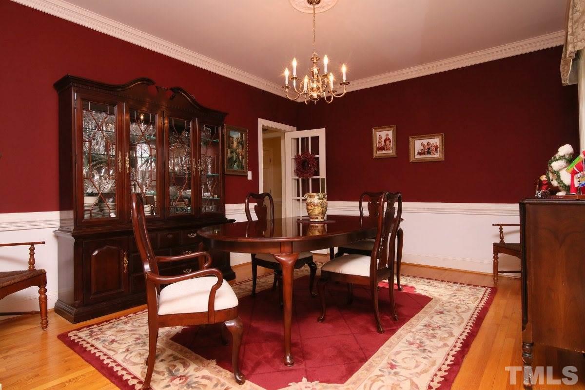 2908 Ballybunion Way Raleigh, NC 27613 - Photo 4 of 25 a view of a dining room with furniture