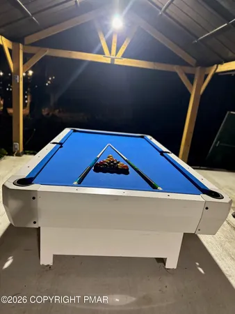 a kitchen with stainless steel appliances granite countertop a stove and a refrigerator