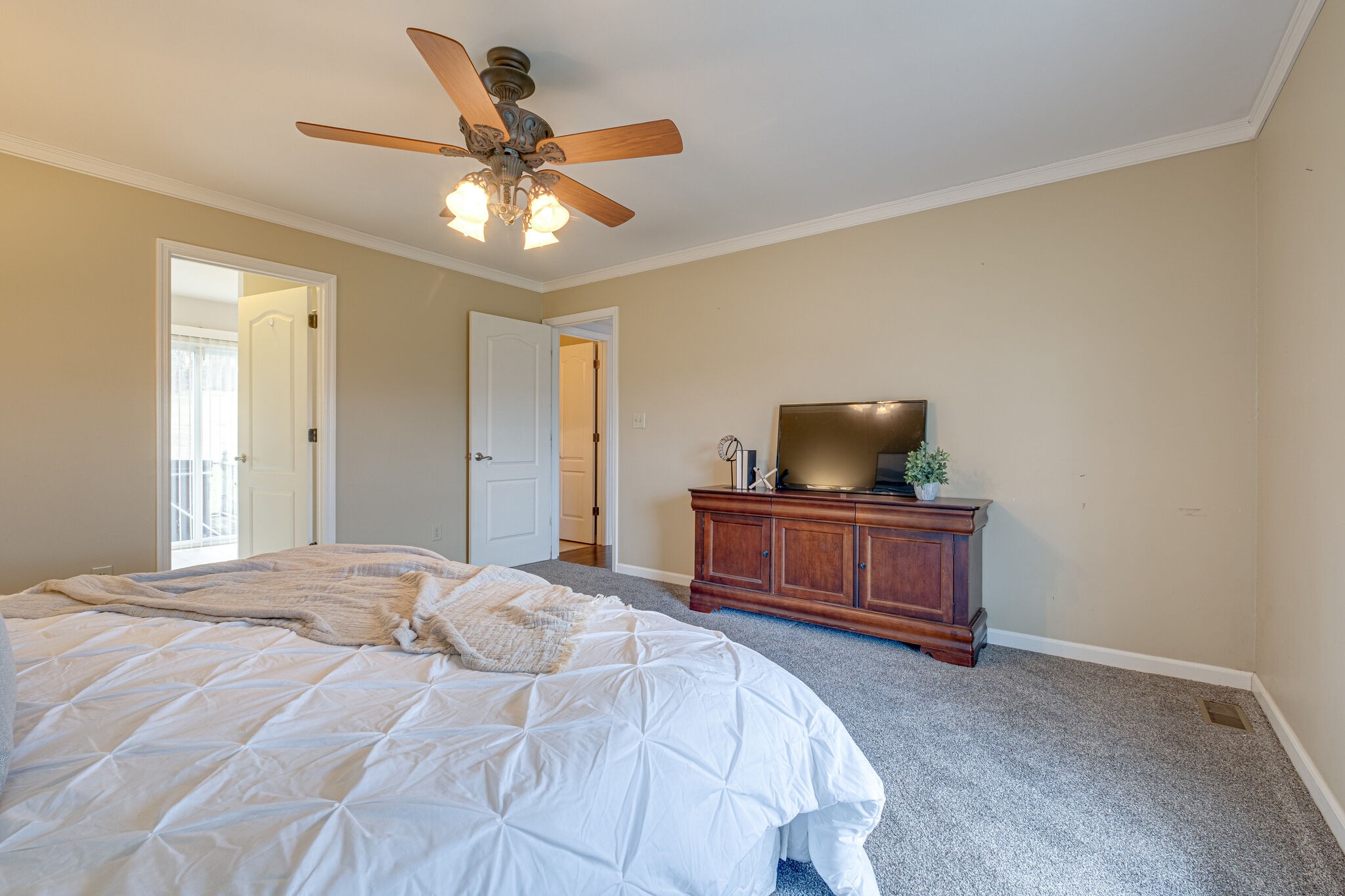 1871 Clara Mathis Road Spring Hill, TN 37174 - Photo 17 of 39 a bedroom with a bed and a table