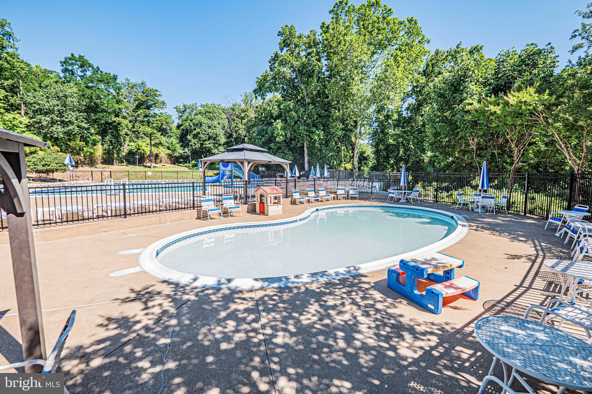 5448 Edsall Ridge Place Alexandria, VA 22312 - Photo 51 of 52 swimming pool view with a outdoor seating