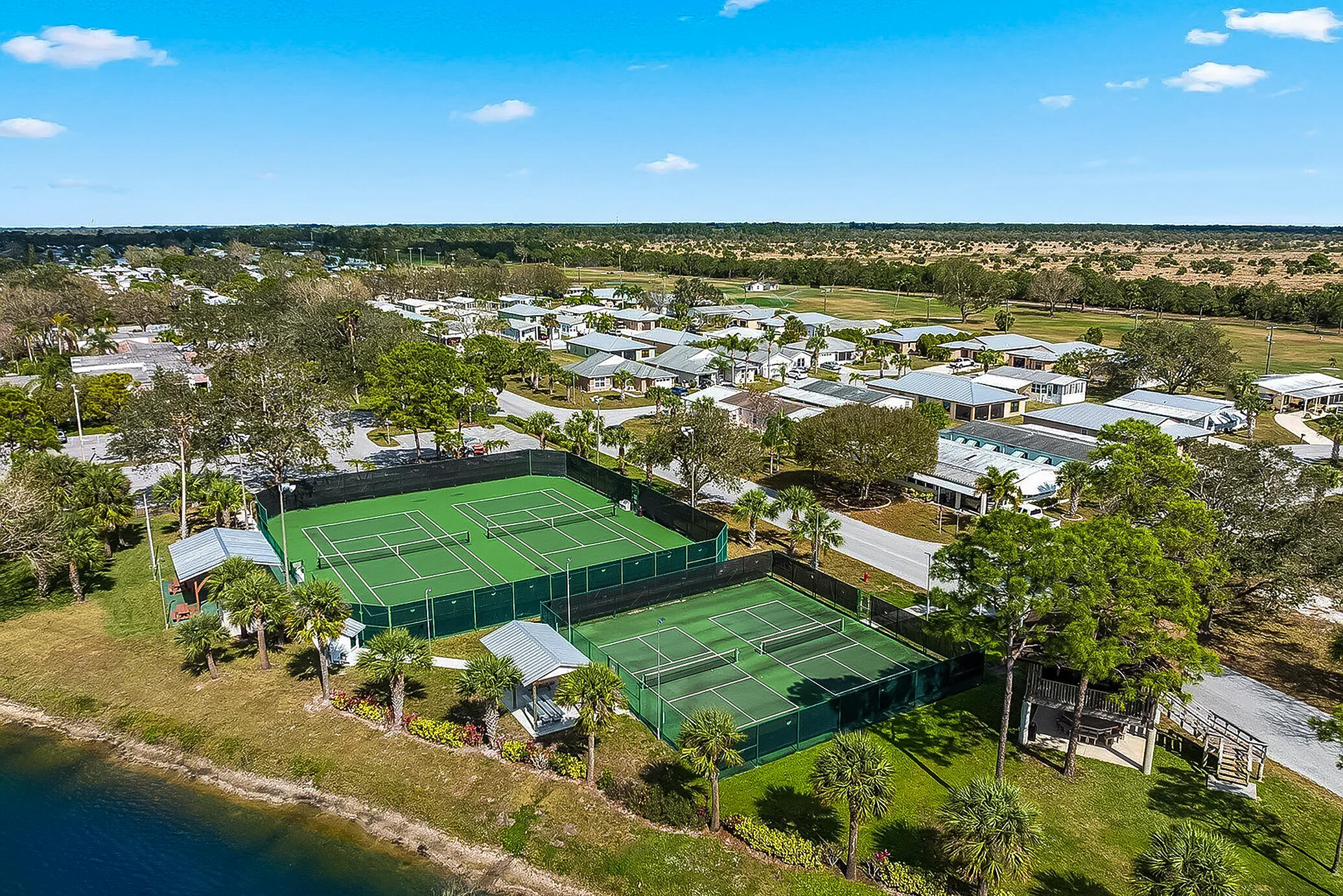 14196 Cisne Circle Fort Pierce, FL 34951 - Photo 32 of 36 Spanish Lakes Pool Pickleball and tennis
