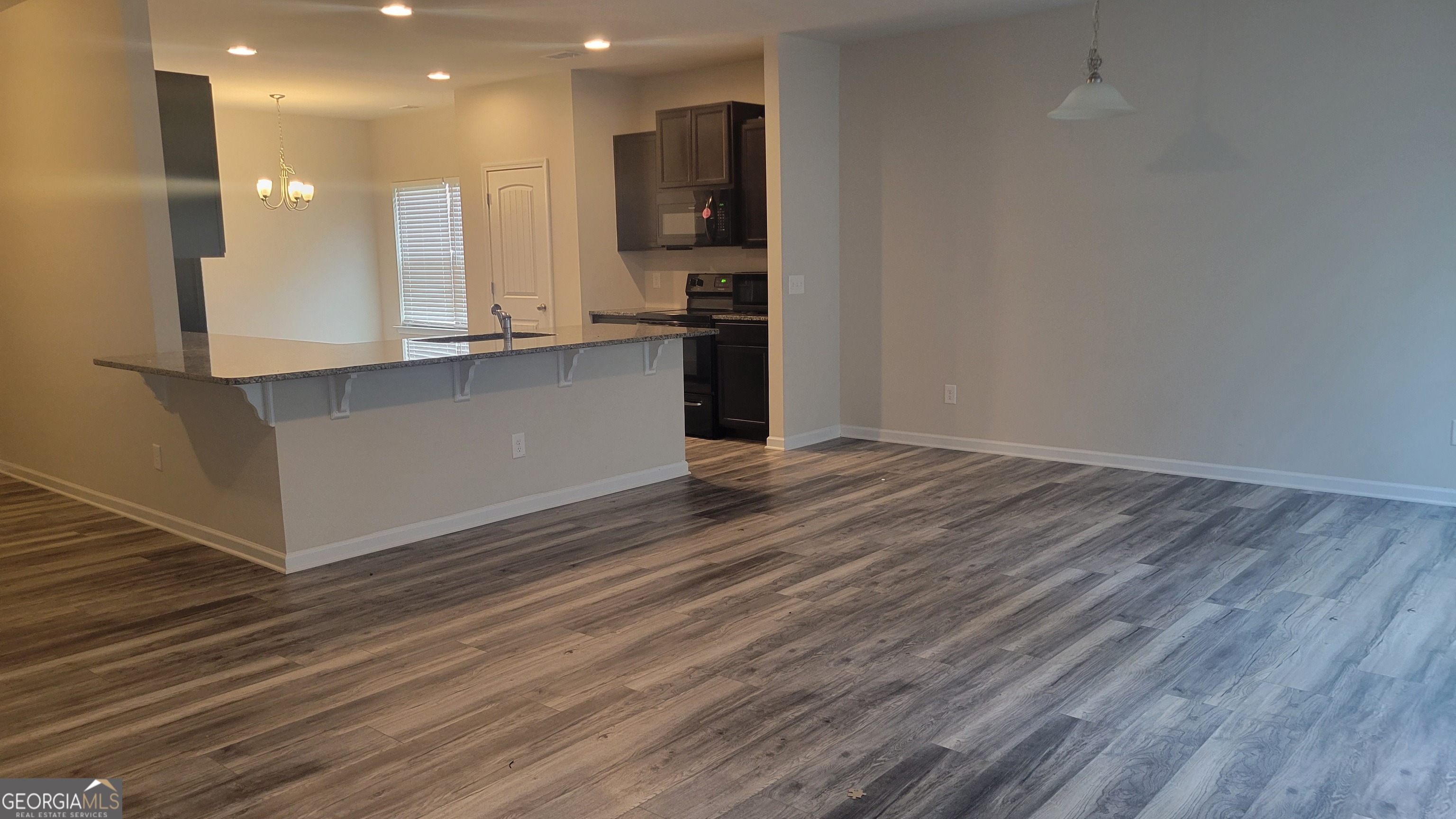 10 Bayberry Circle Southwest Rome, GA 30165 - Photo 13 of 38 a view of kitchen with kitchen island wooden floor and center island