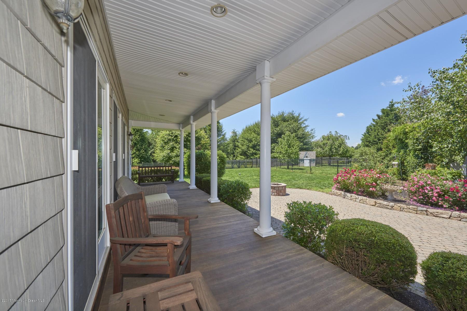 49 Nurko Road Millstone Township, NJ 08535 - Photo 21 of 39 Backyard porch