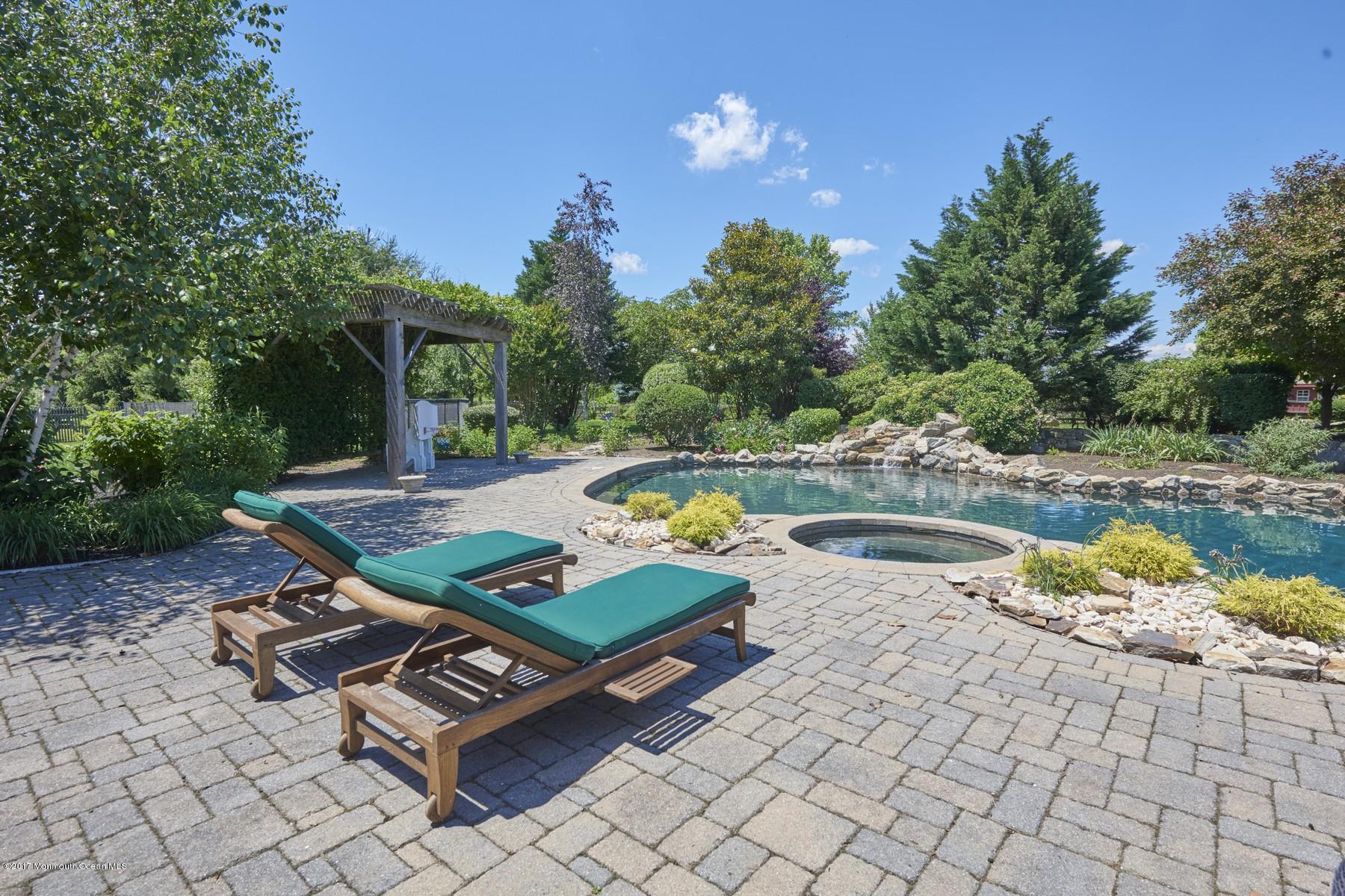 49 Nurko Road Millstone Township, NJ 08535 - Photo 24 of 39 Heated pool with hot tub
