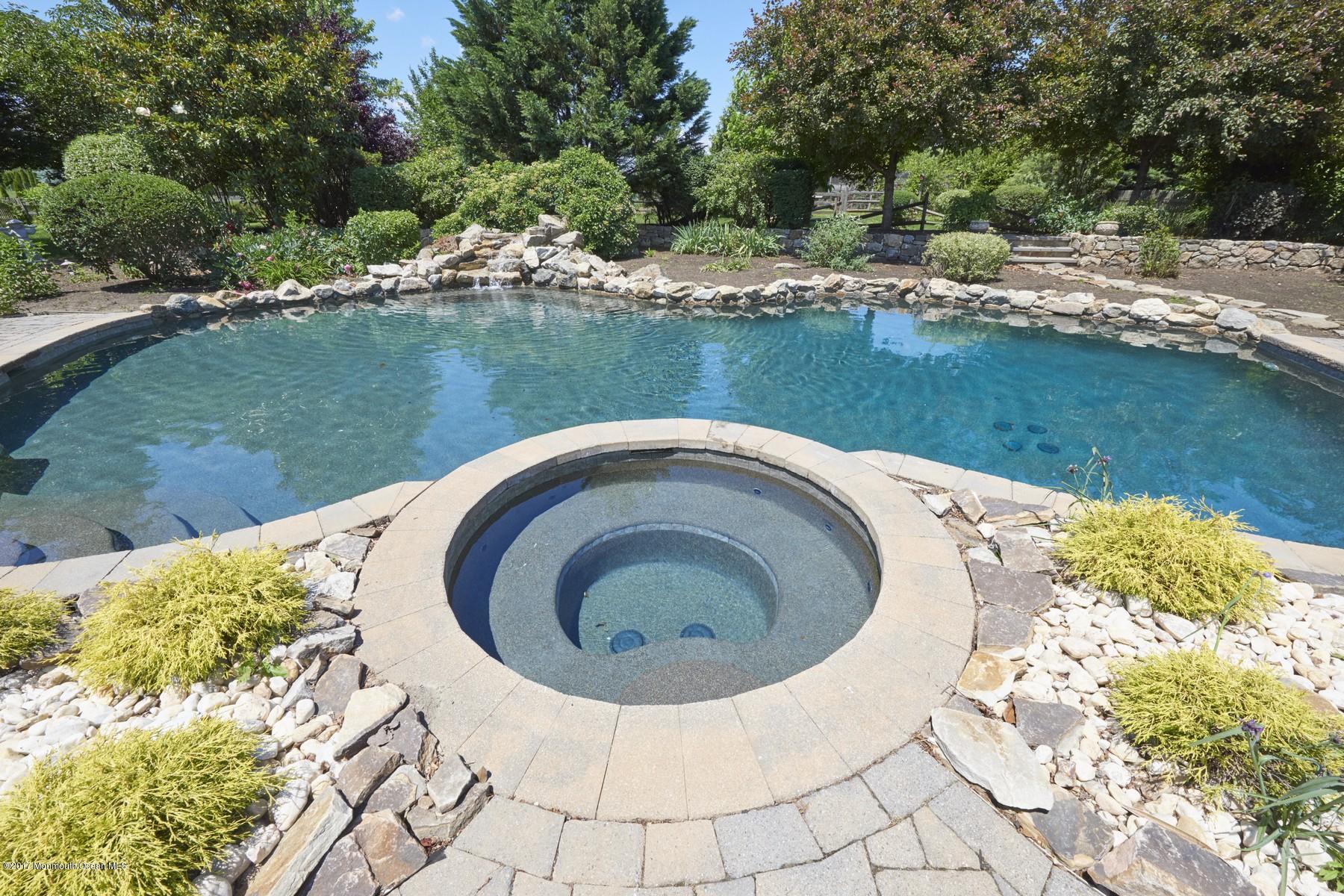 49 Nurko Road Millstone Township, NJ 08535 - Photo 25 of 39 Heated pool with hot tub