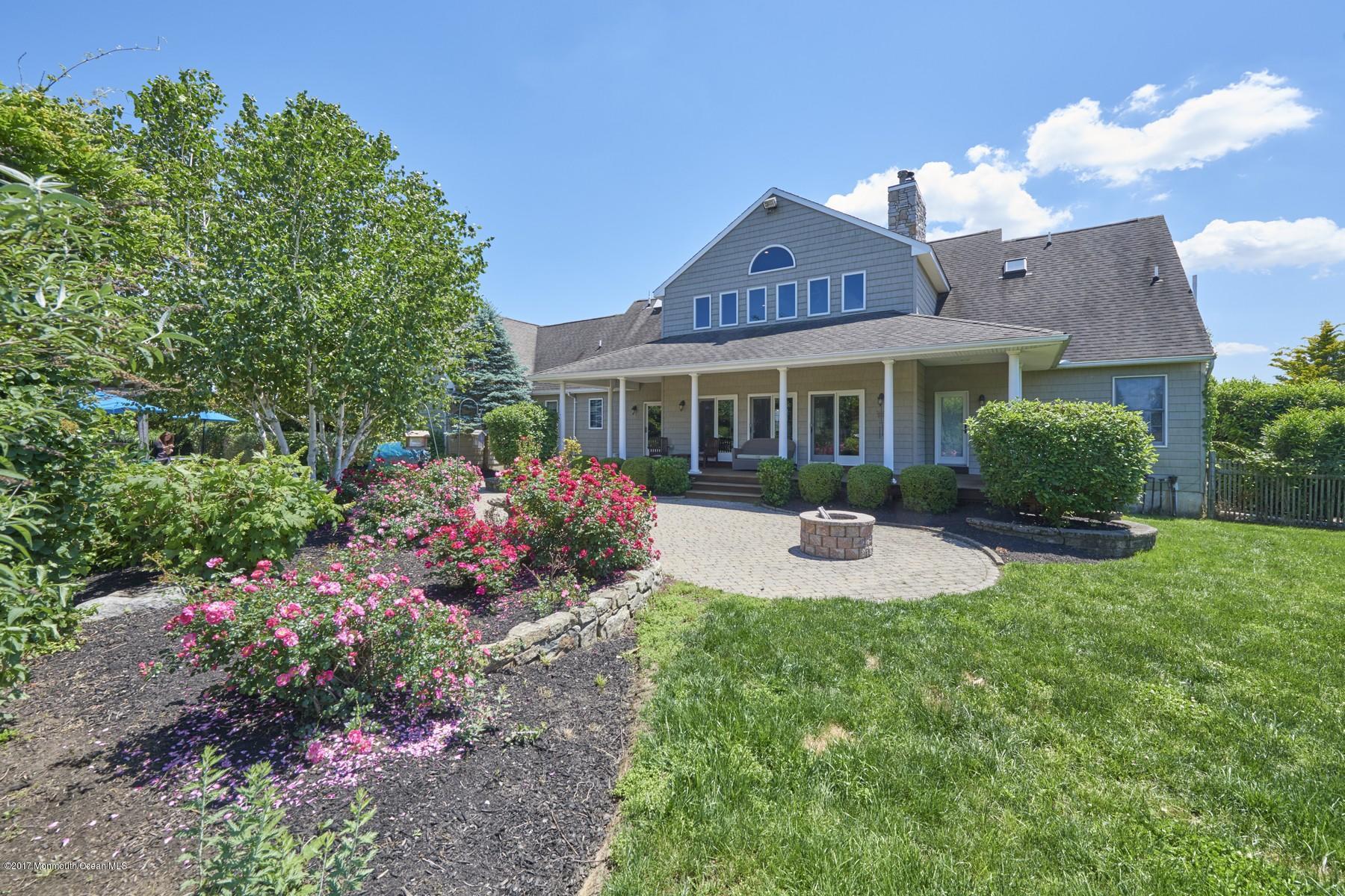 49 Nurko Road Millstone Township, NJ 08535 - Photo 36 of 39 View of back of house and firepit