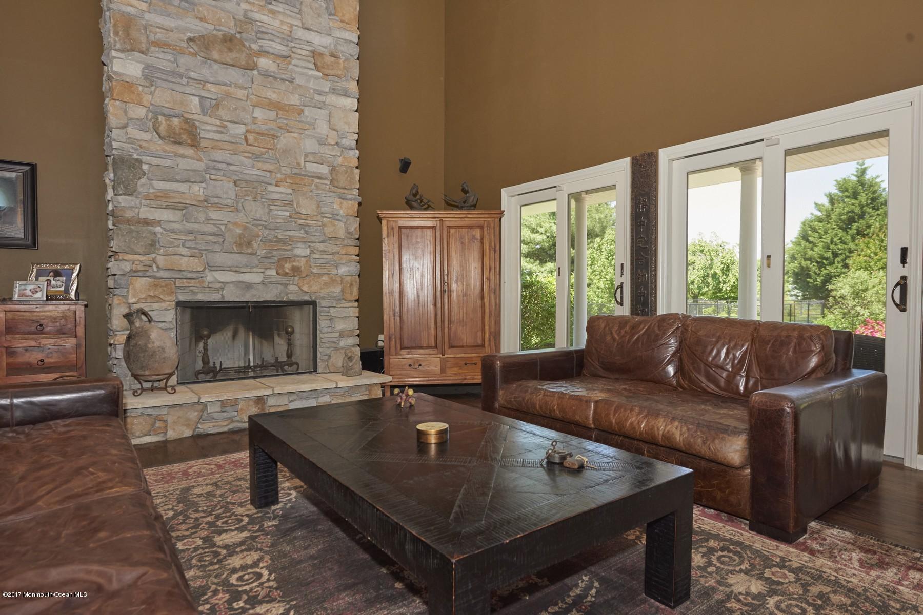 49 Nurko Road Millstone Township, NJ 08535 - Photo 4 of 39 Living room with fireplace