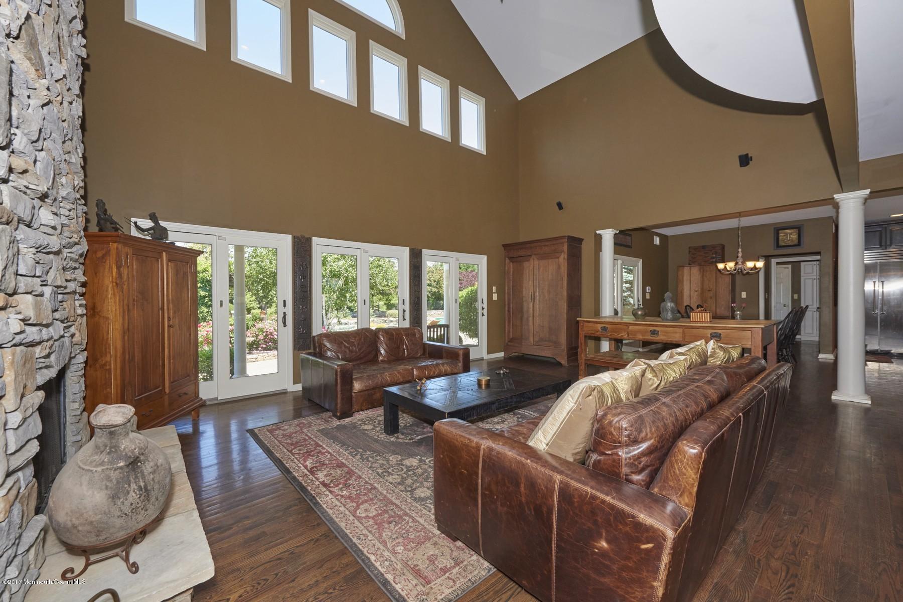 49 Nurko Road Millstone Township, NJ 08535 - Photo 5 of 39 Living room with fireplace