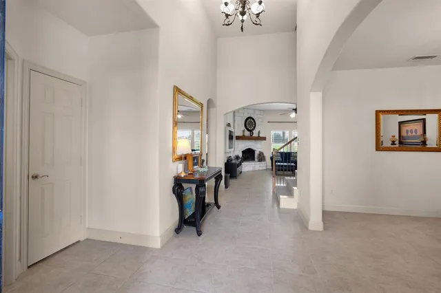 a view of a livingroom with furniture and a window