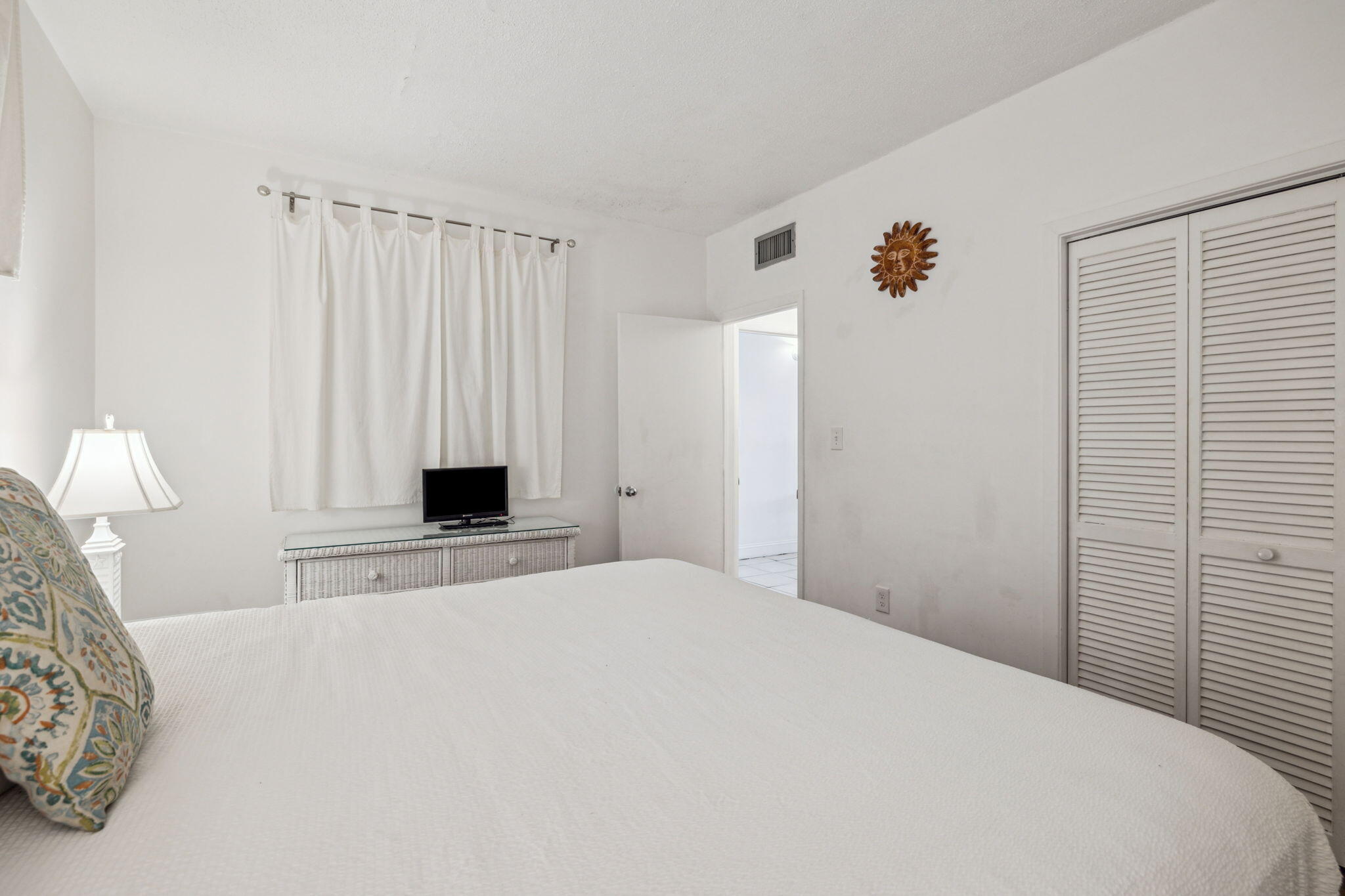 3722 East County Highway 30A, Unit 3 Santa Rosa Beach, FL 32459 - Photo 11 of 22 a bedroom with a bed and a window