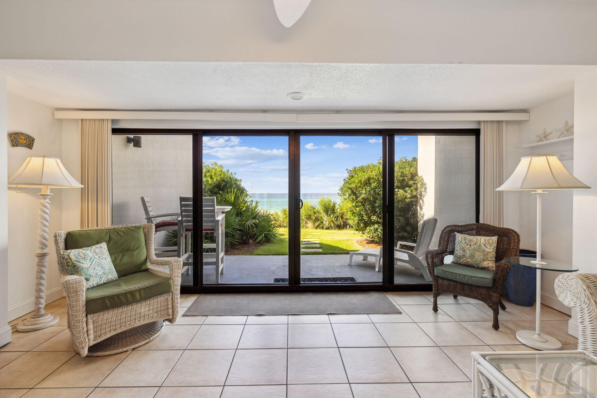 3722 East County Highway 30A, Unit 3 Santa Rosa Beach, FL 32459 - Photo 14 of 22 a living room with furniture and a floor to ceiling window