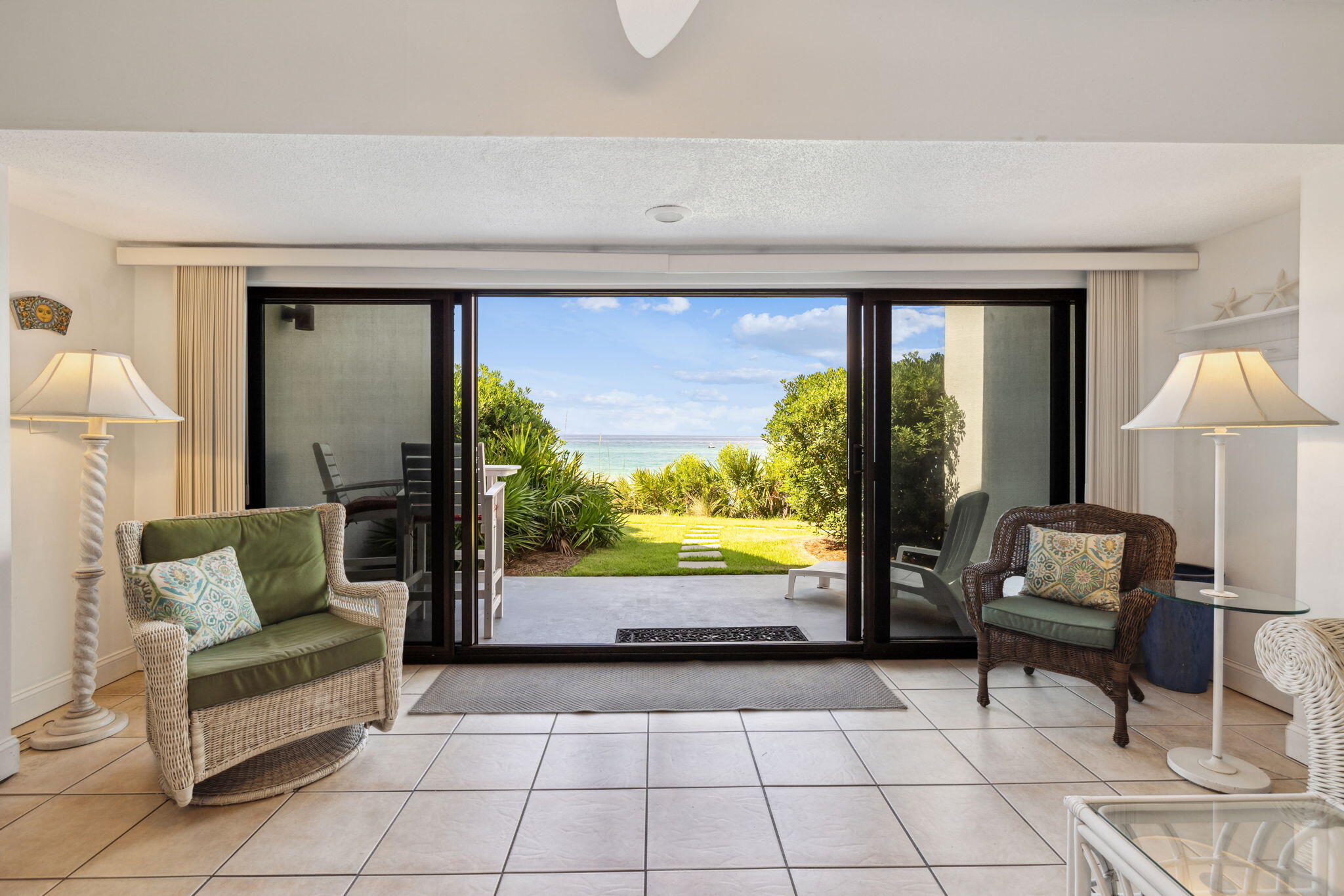 3722 East County Highway 30A, Unit 3 Santa Rosa Beach, FL 32459 - Photo 15 of 22 a living room with furniture and a flat screen tv