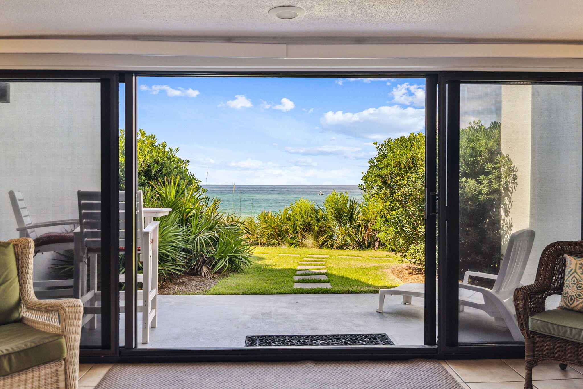 3722 East County Highway 30A, Unit 3 Santa Rosa Beach, FL 32459 - Photo 16 of 22 a view of a living room and floor to ceiling window