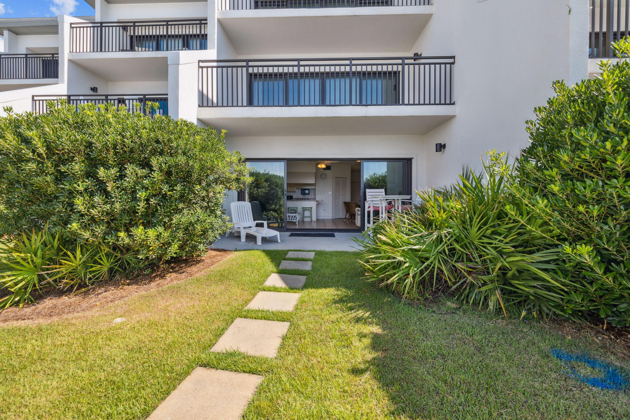 3722 East County Highway 30A, Unit 3 Santa Rosa Beach, FL 32459 - Photo 3 of 22 front view of a house with a yard