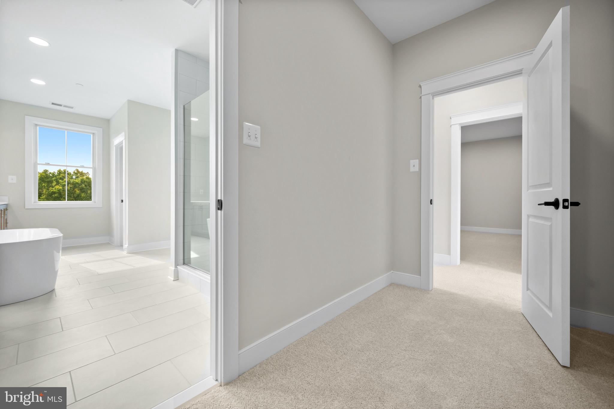 3683 Falling Grn Way Mount Airy, MD 21771 - Photo 33 of 50 a view of a bathroom with a tub and shower