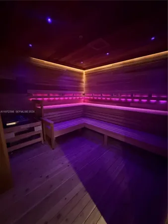 a empty room with a bookshelf