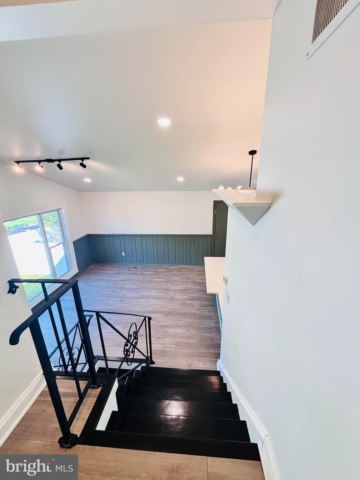 13015 Estelle Road Silver Spring, MD 20906 - Photo 16 of 38 a view of entryway with furniture and wooden floor