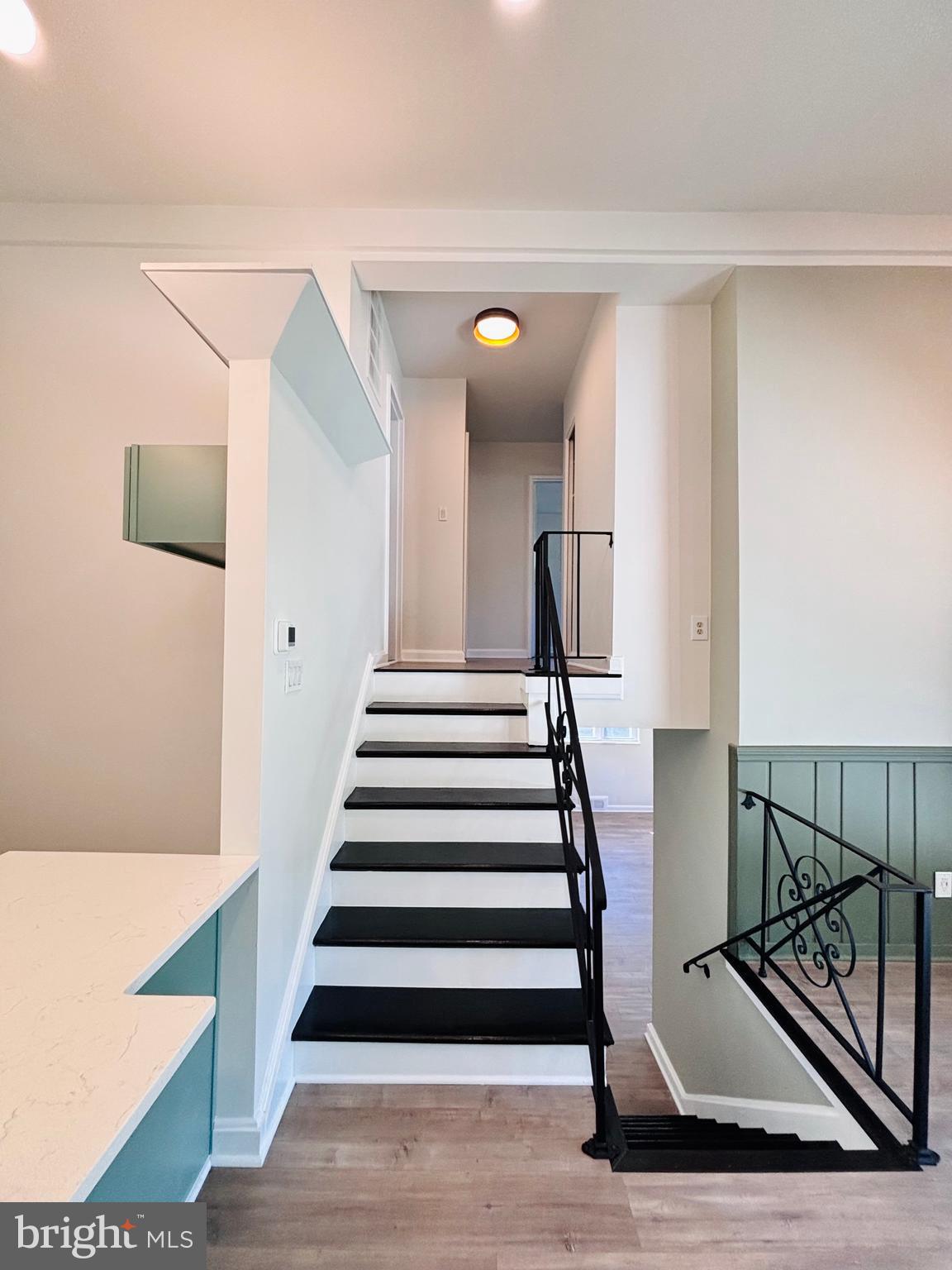 13015 Estelle Road Silver Spring, MD 20906 - Photo 17 of 38 a view of entryway and hall with wooden floor