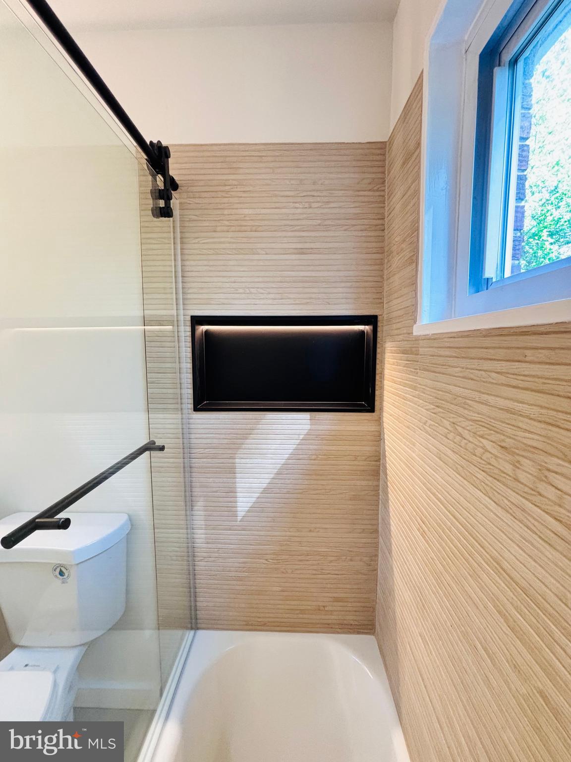 13015 Estelle Road Silver Spring, MD 20906 - Photo 25 of 38 a bathroom with a toilet and a shower