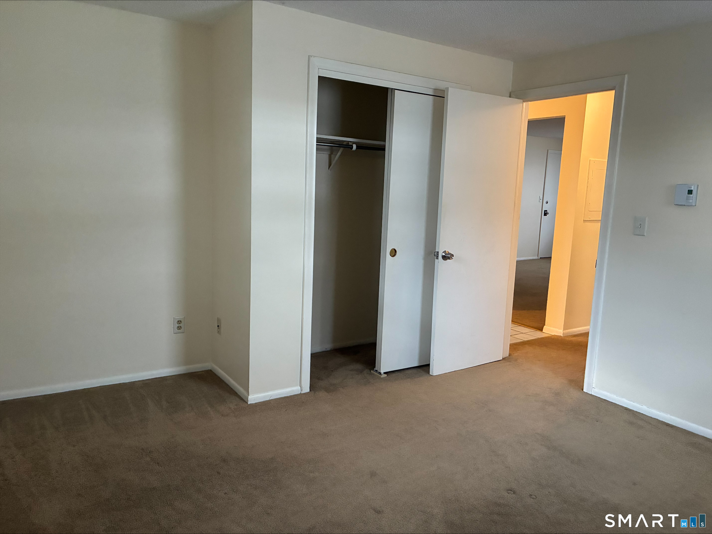 26 College Street, Unit 2 Clinton, CT 06413 - Photo 15 of 27 a view of an empty room with closet and closet