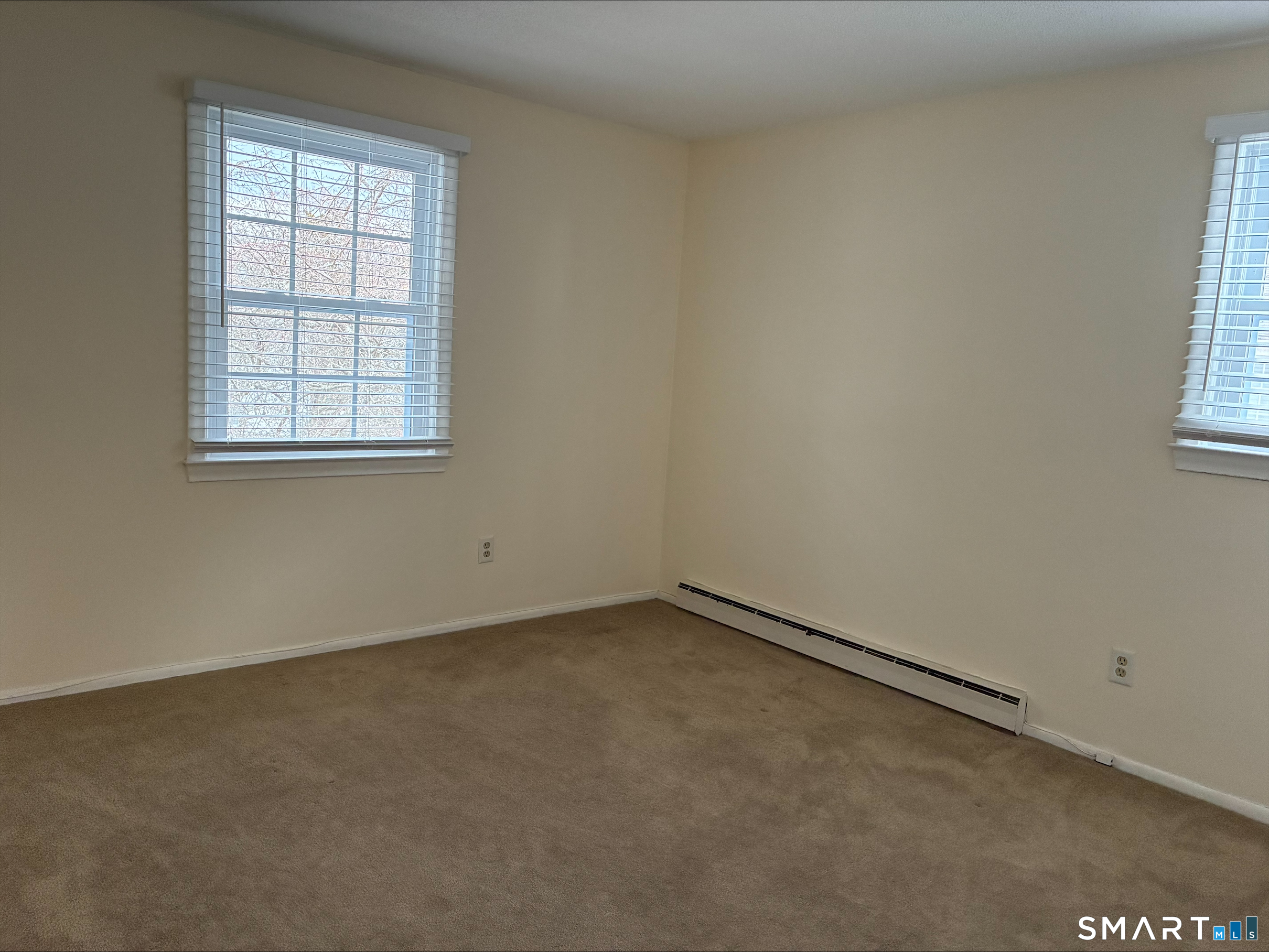 26 College Street, Unit 2 Clinton, CT 06413 - Photo 16 of 27 an empty room with a window