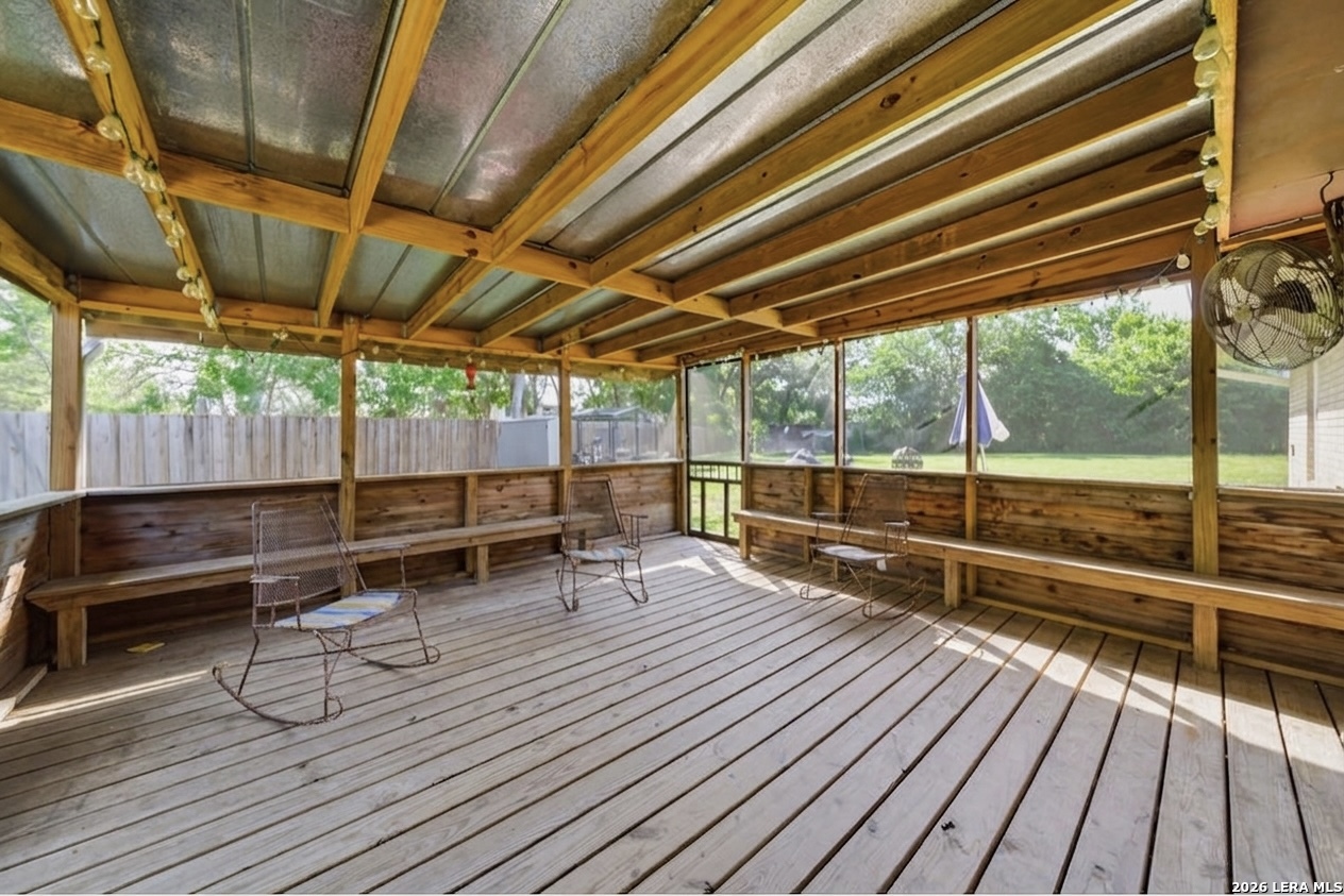 365 State Highway 95 Elgin, TX 78621 - Photo 23 of 34 a view of a wooden deck with a bench