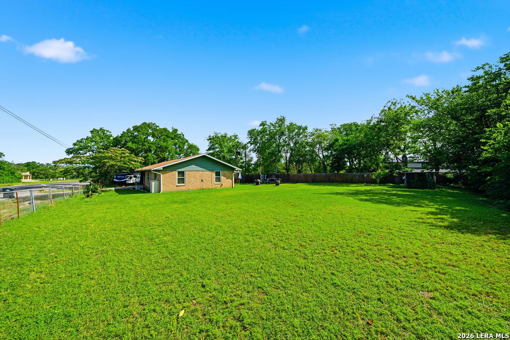 365 State Highway 95 Elgin, TX 78621 - Photo 26 of 34 a front view of a house with garden