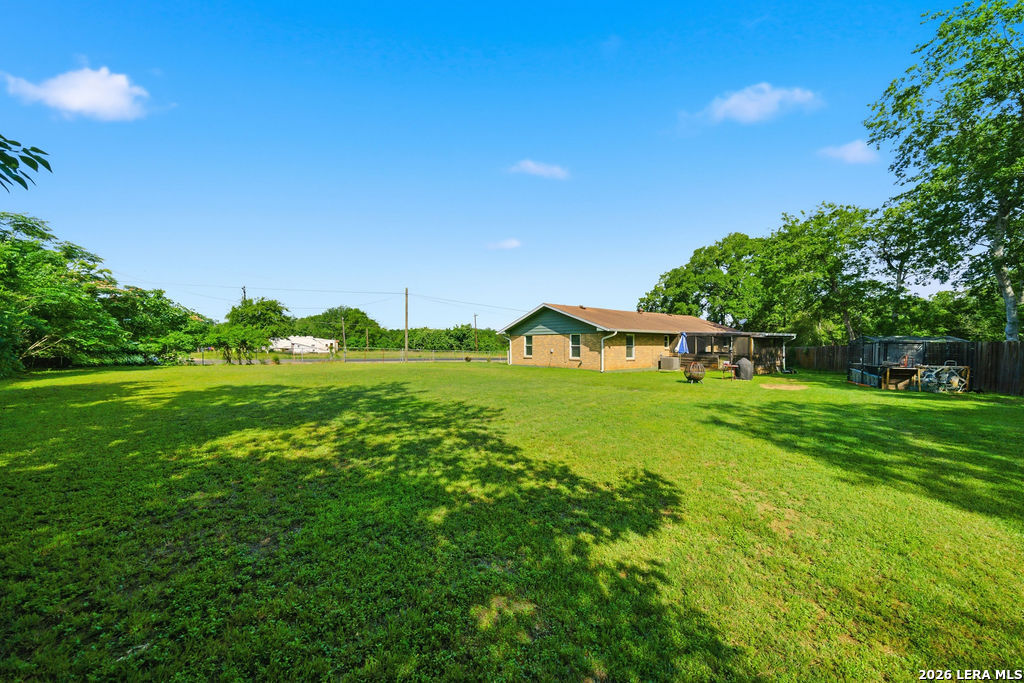 365 State Highway 95 Elgin, TX 78621 - Photo 29 of 34 a view of a garden with plants and large trees